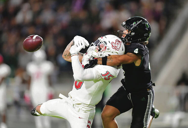 STEVEN ERLER/SPECIAL TO THE STAR-ADVERTISER / NOV. 30
Hawaii Warriors defensive back Cam Stone (4) knocked down a long pass.