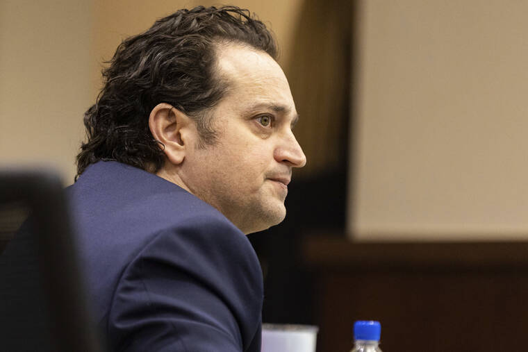 ALICIA DEVINE/TALLAHASSEE DEMOCRAT VIA ASSOCIATED PRESS
Charlie Adelson looks at jurors as his defense attorney presents closing arguments, on Nov. 6, in Tallahassee, Fla. A judge sentenced the South Florida dentist to life in prison, today, in the 2014 shooting death of his former brother-in-law, a prominent professor at Florida State University, following a bitter custody battle.