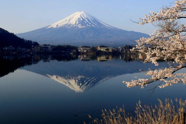 REUTERS
Mount Fuji, a UNESCO World Heritage site, is visible from Lake Kawaguchiko, in Fujikawaguchiko, Japan.