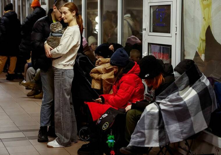 REUTERS/Alina Smutko
People take shelter inside a metro station during a Russian military attack, amid Russias attacks on Ukraine, in Kyiv, Ukraine.