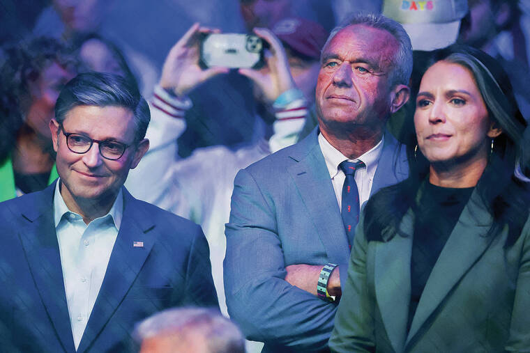 BRAD PENNER / IMAGN IMAGES / NOV. 16
U.S. House Speaker Mike Johnson, left, stands with Robert F. Kennedy Jr. and former U.S. Rep. Tulsi Gabbard during UFC 309 at Madison Square Garden.