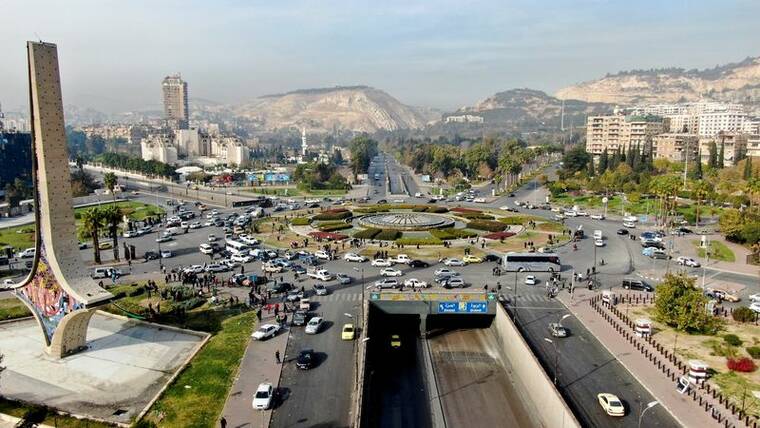 REUTERS/MAHMOUD HASSANO
A drone view shows vehicles on the street in Damascus after Syrian rebels ousted President Bashar al-Assad, today.