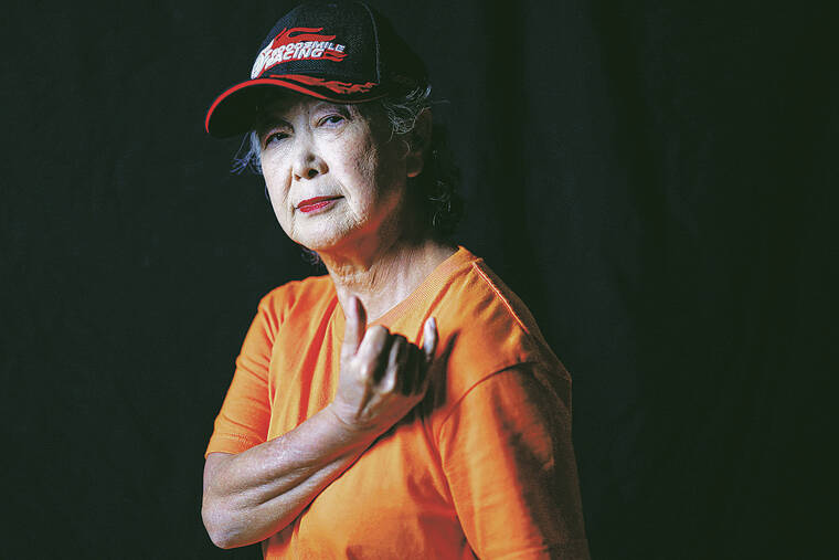 KYUNG HOON KIM / REUTERS
At top, Saruwaka Kiyoshie, 74, is a member of Ara Style Senior, Japans only breakdancing club made up of older women.