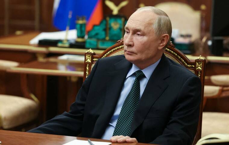 SPUTNIK/VYACHESLAV PROKOFYEV/POOL VIA REUTERS /FILE PHOTO
Russian President Vladimir Putin meets with Yevgeny Balitsky, Moscow-installed governor of the Russian-controlled parts of Ukraines Zaporizhzhia region (not pictured), amid the Russia-Ukraine conflict, at the Kremlin in Moscow, Russia, on Nov. 18. Putin today lowered the threshold for a nuclear strike in response to a broader range of conventional attacks, and Moscow said Ukraine had struck deep inside Russia with U.S.-made ATACMS missiles.