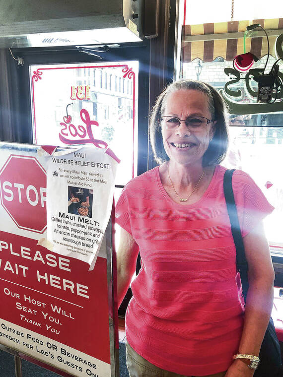 Kaneohe resident Barbara Honda went to get a bite at Leos in Stillwater, Minn., and was grateful to see the restaurant had created the Maui Melt, a special sandwich to generate donations for the Maui Wildfire Relief fund. Photo by Roy Honda.